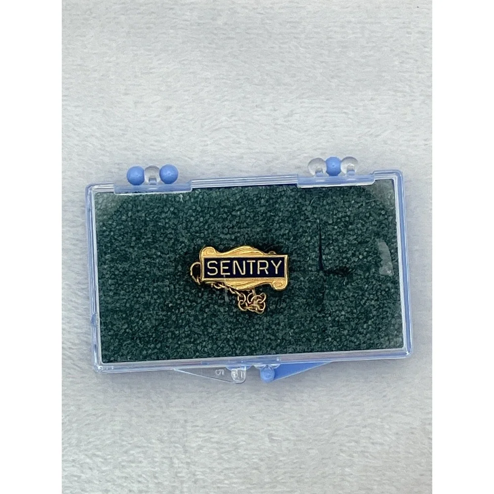 Vintage Sentry Insurance Gold Tone Black Enamel Lapel Pin Tie Tack Safety Chain